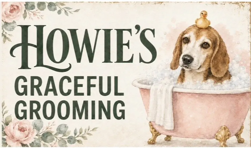 Howie's Graceful Grooming: gentle dog grooming in Concord, NC. A beagle sits in a pink clawfoot tub with a rubber duck on his head.