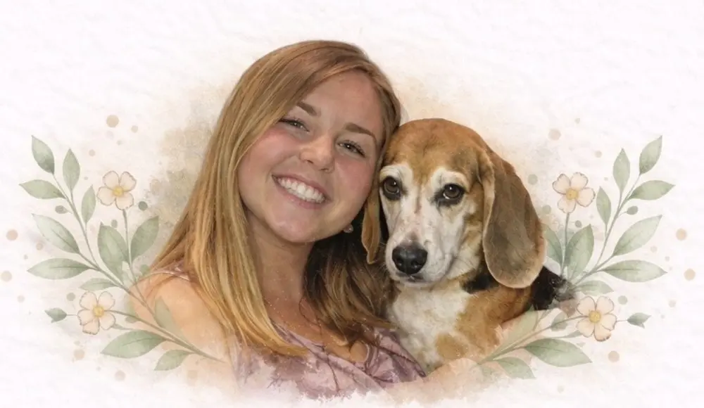 Jessica smiling with her beagle, Howie